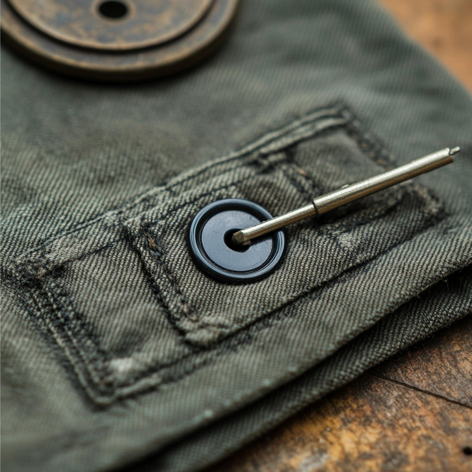 Finished embroidered badge on denim
